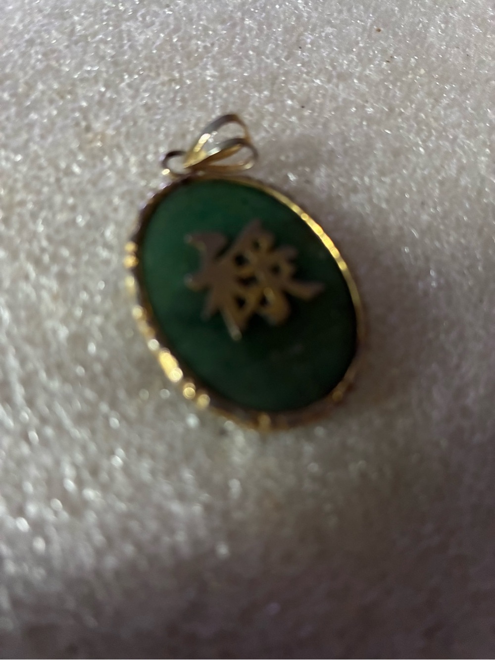 Gold-Trim Green Jadeite Oval Pendant with Chinese Character
